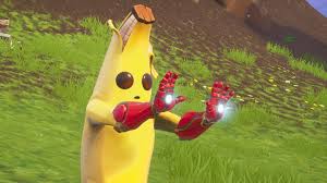 The outfit is most likely based on the banana from the it's peanut butter jelly time! trend. Peely Stares At His New Gloves Realising The Power He Now Has Fortnitebr