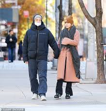 Suki Waterhouse walks hand in hand with beau Robert Pattinson