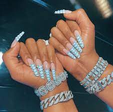 Houston rapper megan thee stallion doesn't know what a bad nail day looks like. 