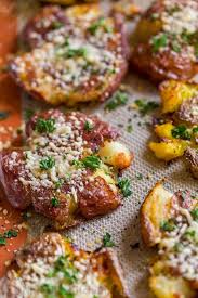 These Cheesy Smashed Potatoes Are Crisp On The Outside With A Creamy Center And Irresistible Cheesy Crus Smashed Potatoes Recipe Smashed Potatoes Baked Recipes