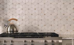 Mosaic backsplashes are a common feature in kitchens because of the visual interest they can add as well as the relatively low maintenance they require. Backsplash Tile Kitchen Backsplashes Tile Backsplashes