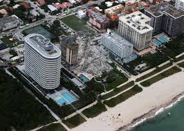This aerial view shows search and rescue personnel working on site after the partial collapse of the. Eolq2jrruyvcom