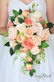 We did not find results for: Cascading Teardrop Coral And Peach Wedding Flower Brides Bouquet With Lilies Orchids Lambs E Bridal Wedding Flowers Peach Wedding Flowers Peach Wedding Theme