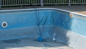 Get rid of any debris in the water, vacuum the pool and clean the filter. Vinyl Pool Liner Replacement Cost Steps Tips Vinyl Pool Pool Liner Pool Liner Replacement
