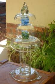 My 3rd Totem Made From Glassware Bought At Garage Sales And Opshops It S Callied Bubbles Due To The Rou Garden Art Crafts Glass Garden Art Upcycle Glass