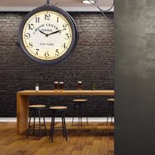 Each side runs on one double `aa` battery. Train Station Clock Double Sided Buy Here