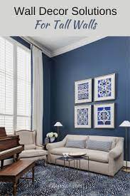 Wall Decor Solutions For Tall Blank Walls Designed Blue Walls Living Room Blue Living Room Decor Blue Living Room