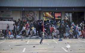 Looting following nightly riots in johannesburg, south africa. Foh0b6fuyvwlhm