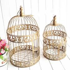 Check out our decorative bird cage selection for the very best in unique or custom, handmade pieces from our shops. European Gold Vintage Birds Cage Fashion Cinnamon Iron Birdcage Wedding Decoration Props Decoration From Jewelry520wholesale 35 28 Dhgate Com