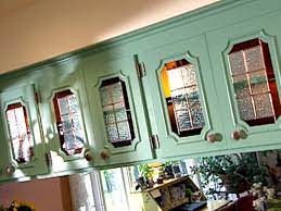 Install the new glass panels in the kitchen cabinet doors. Update Kitchen Cabinets With Glass Inserts Hgtv