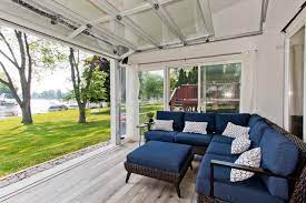 Your patio enclosures sunroom will hold its color and new look. Glass Paneled Garage Doors Open Up A New Sunroom