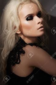 Beautiful Blond Woman Model In Chic Lacy Black Dress, With Dark Punk Rock  Gloss Make-up. Evening And Night Style Фотография, картинки, изображения и  сток-фотография без роялти. Image 11713957