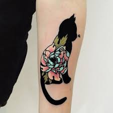 Cats have been used as symbols throughout history. Black Cat With Flowers Tattoo Tattoogrid Net