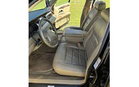 Image result for Charcoal Green 1999 Town Car