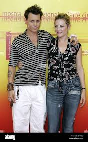 JOHNNY DEPP & KATE WINSLET FINDING NEVERLAND PHOTOCALL 61ST VENICE FILM  FESTIVAL LIDO VENICE ITALY 04 September 2004 Stock Photo - Alamy