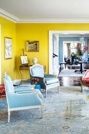 Some of our favorite white and warm gray paint colors to check out for your kitchen include revere pewter and simply white by benjamin moore or pure white and agreeable gray by sherwin williams. 40 Best Living Room Color Ideas Top Paint Colors For Living Rooms