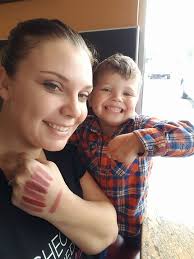 The boy is marketing himself at the tournament