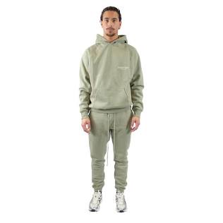 The iconic relaxed drape and clean neckline profile of the Essentials hoodie silhouette., AI generated