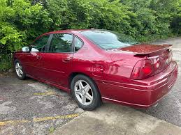 Image result for Victory Red 2003 Impala