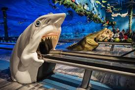A One Of A Kind Ocean Themed Restaurant And Bowling Alley Uncle Buck S Fish Bowl And Grill In Florida Is Insanely Fun Uncle Buck Bowling Bowling Alley