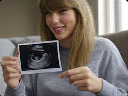 Watch this fan priceless reaction as Taylor Swift gifted her the coat and  skirt she wore at Children's Mercy Hospital after the fan complimented her  outfit and called it “tea” during the