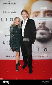 Sydney, Australia. 19 December 2016. Pictured: Angela Bishop and husband  Peter Baikie. The cast and crew of LION arrived