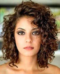 Depending on the product you are using, take the prescribed quantity on your palms, flip your hair upside down by bending down your head and work the product into your hair. Shoulder Length Curly Hair Styles