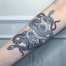 A classic libra tattoo is of the goddess themis or justicus holding the scales and symbols. Mesmerizing New Serpentine Tattoos By Mirko Sata Colossal