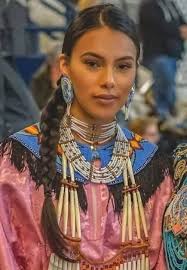 Beautiful matching mother daughter regalia. Hunkpapa and Oglala Lakota.  Credit: Julia Rose White Bull