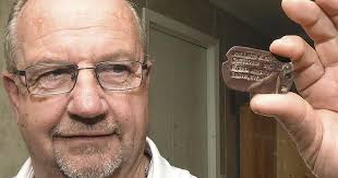 A piece of metal, a piece of a man, a piece of a family