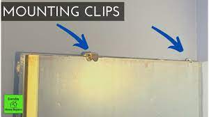 This easy tutorial will show you how to frame your bathroom mirror even though it. Removing A Bathroom Mirror Mounting Clips Or Brackets Youtube