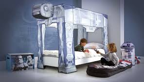 This star wars bedroom features star wars bedding, star wars wall decorations, star wars art, light sabers, a death star speaker and more. Star Wars Themed Bedroom Ideas