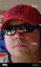 U.S. Air Force Staff Sgt. Andrew Schick, 39th Security Forces combat arms  training and maintenance instructor, supervises 39th SFS Airmen behind the  firing line Nov. 17, 2017, at Incirlik Air Base, Turkey.