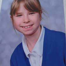 SID JAMES and JOAN SIMS enjoying a cuddle behind the bar.