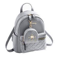 A leather backpack purse has two straps and is carried on both shoulders. Pin On Fashion Backpacks