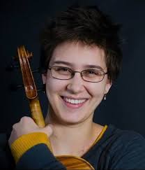 Violist achieves her graduate school dream and becomes an international  champion