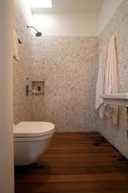 Wooden Floor Entire Room Drains Between Floor Boards To A Lower Pitched Floor With A Drain I Want This Wet Rooms Small Bathroom Bathroom Renovations