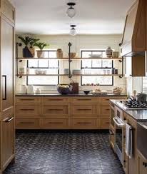 In this kitchen, the streamlining went even further than the kitchen cabinets, into the window frames and ceiling beams. Rustic Farmhouse Engrained Cabinetry Countertops