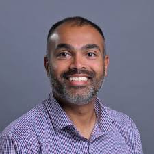 The CPA Man, Peter Olinto, stopped by the Dallas Becker Professional  Education classroom to say hello to Liliana Hickman-Riggs and William Riggs  as well as the candidates attending class!