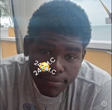 Photo of the young man that was shot and killed in the Bain Town area  yesterday evening. 242 sends condolences to the family and friends of the  victim and may he rest