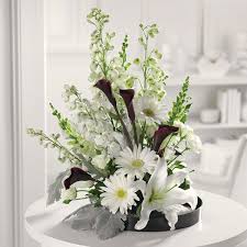 Order your flowers at the florist who is known for the top quality and flower ordering and delivery. Black White Style Smiths Flowers