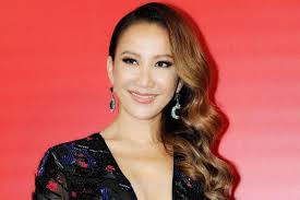 Singer and Voice of Mulan CoCo Lee Dead by Suicide at Age 48, Siblings  Confirm