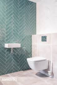 groene visgraat tegels in de toiletruimte badkamer visgraat tegel badkamer tegels ontwerpen