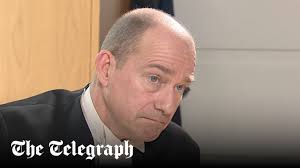 Judge with motor neurone disease uses synthetic voice in court