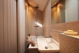 Design ideas for a mediterranean ensuite bathroom in channel islands with shaker cabinets, light wood cabinets, a corner bath, a. Tiny Ensuite Houzz