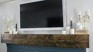 Decorative frame for wall fireplace. How To Build A Cheap And Easy Tv Frame That Swivels Lovely Etc