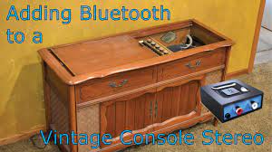 It's of wood with a brown finish. Adding Bluetooth To A Vintage Console Stereo Youtube