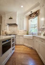 Designed By Main Street Cabinet Co Inset Doors With Top Boxes Exposed Hinges And Tone On Tone Whites Create A Cle Kitchen Traditional Kitchen White Kitchen