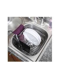 dish drying rack in sink, on counter