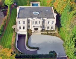 A Sweeping Heated Driveway Leads To An Underground Garage With Turn Table In Our Design Of This Classicall Underground Garage Heated Driveway Underground Homes